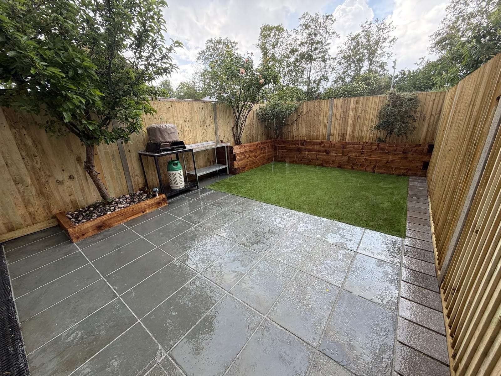 Slab patio fencing and planters, by GRD Landscaping Ltd
